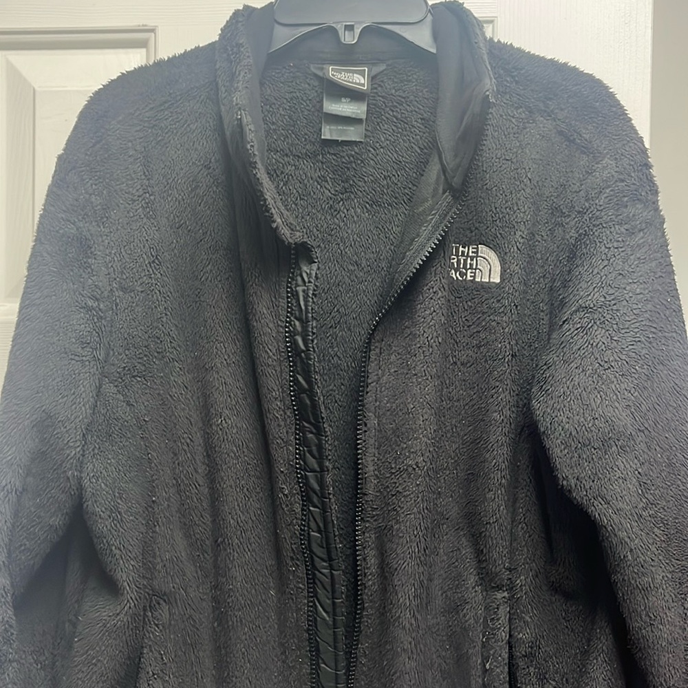 Black women’s Northface furry size small jacket